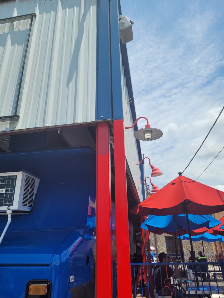 Taco Veloz food truck with vibrant branding and a modern curbside ordering setup.